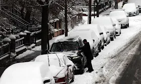 Winter storm brings heavy snow and ice to busy holiday travel weekend