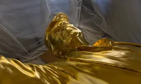 ‘Don Colossus,’ a Golden Statue of President Trump, Waits for Its Home